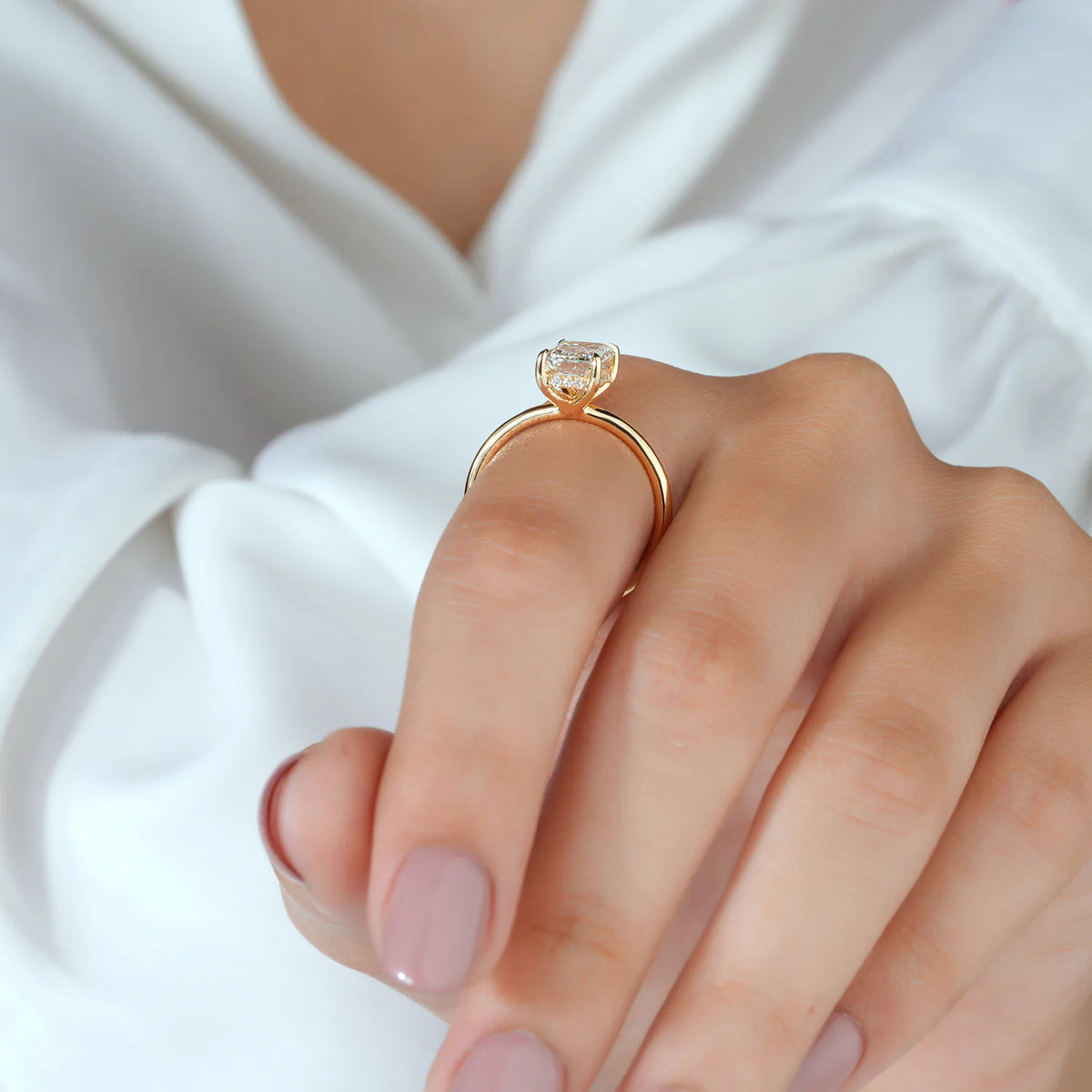 Emerald Cut Solitaire Ring with Hidden Accent