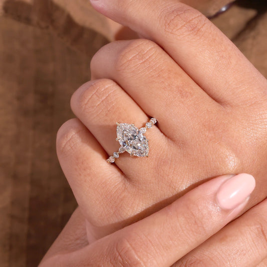 Marquise Diamond Ring with Hidden Halo and Scattered Diamond Ring