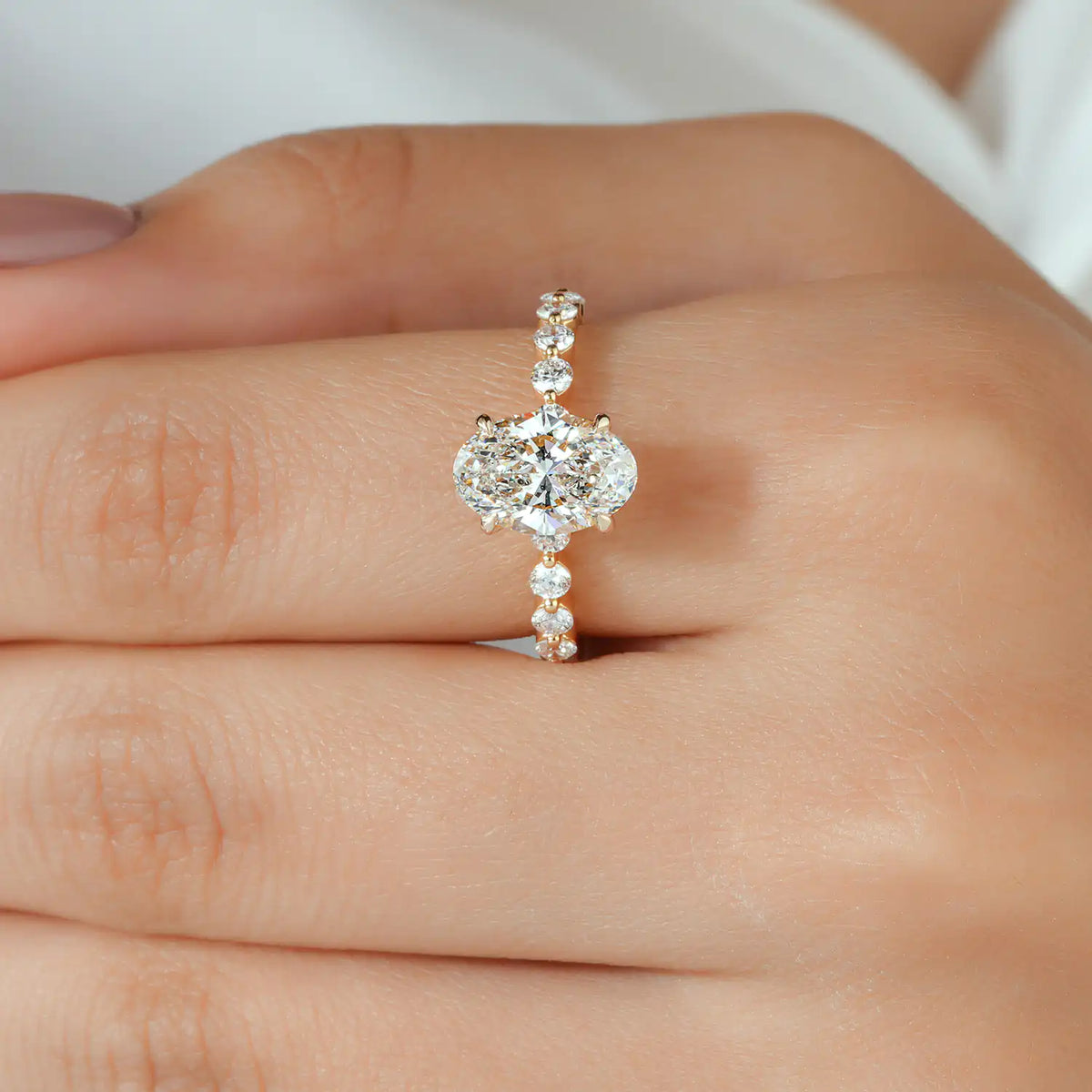 Oval Lab Grown Diamond Engagement Ring with Round Diamond Side Stones