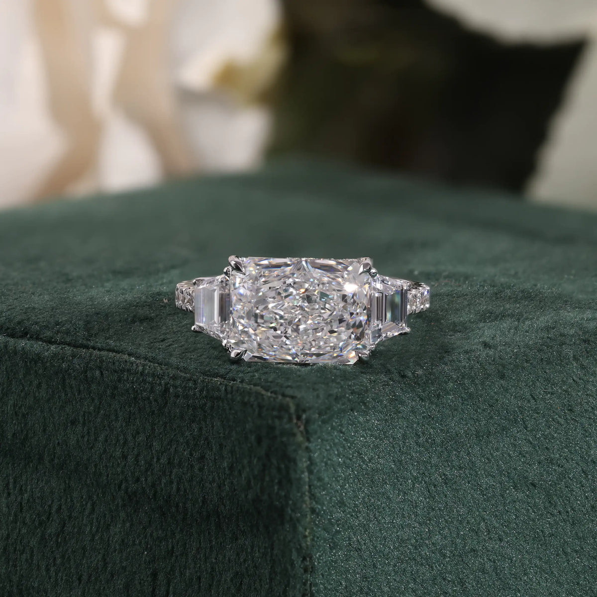 Radiant Cut Lab Grown Diamond Ring with Trapezoid Side Stones and Pave Shank
