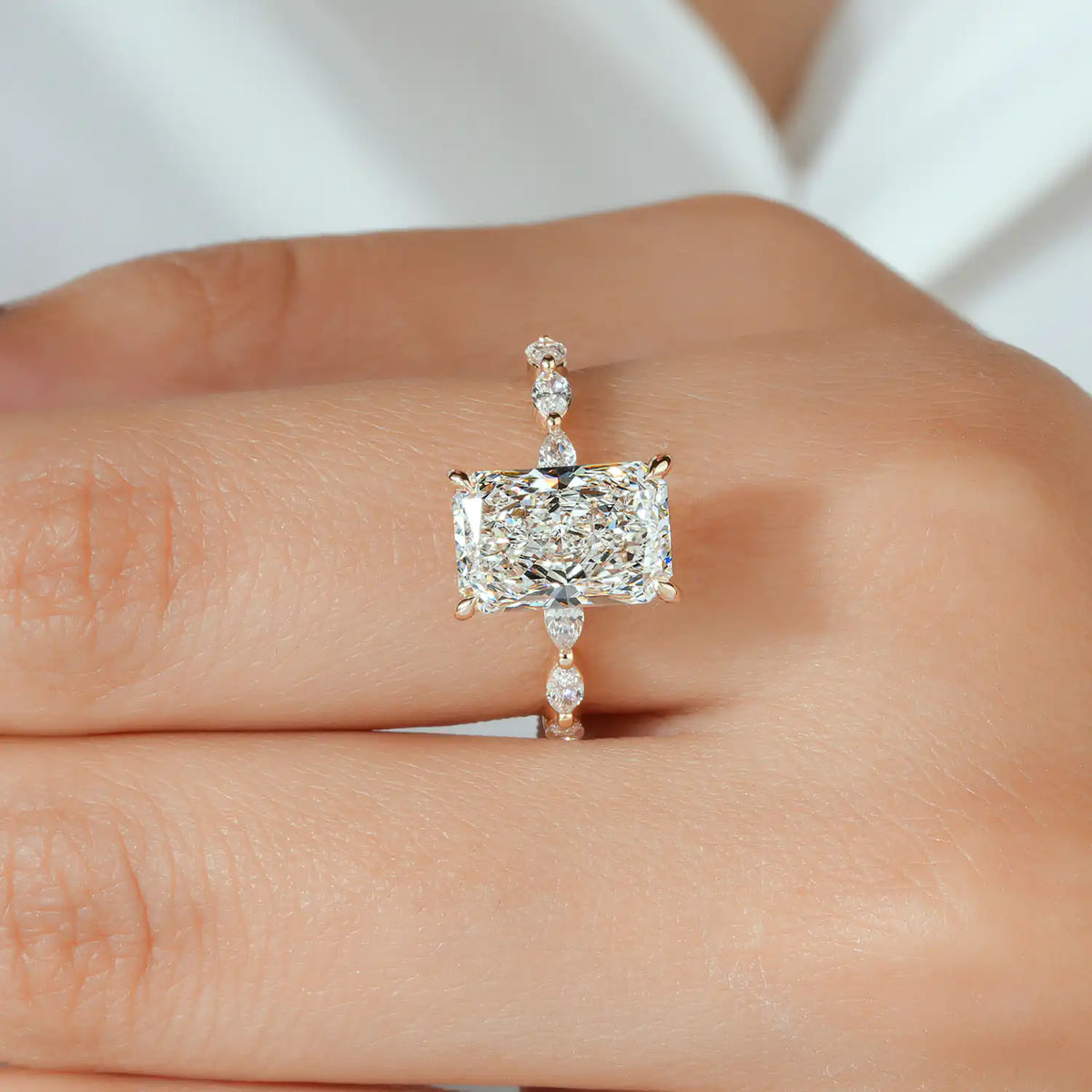 Radiant Cut Lab Grown Diamond Engagement Ring with Marquise and Round Accents