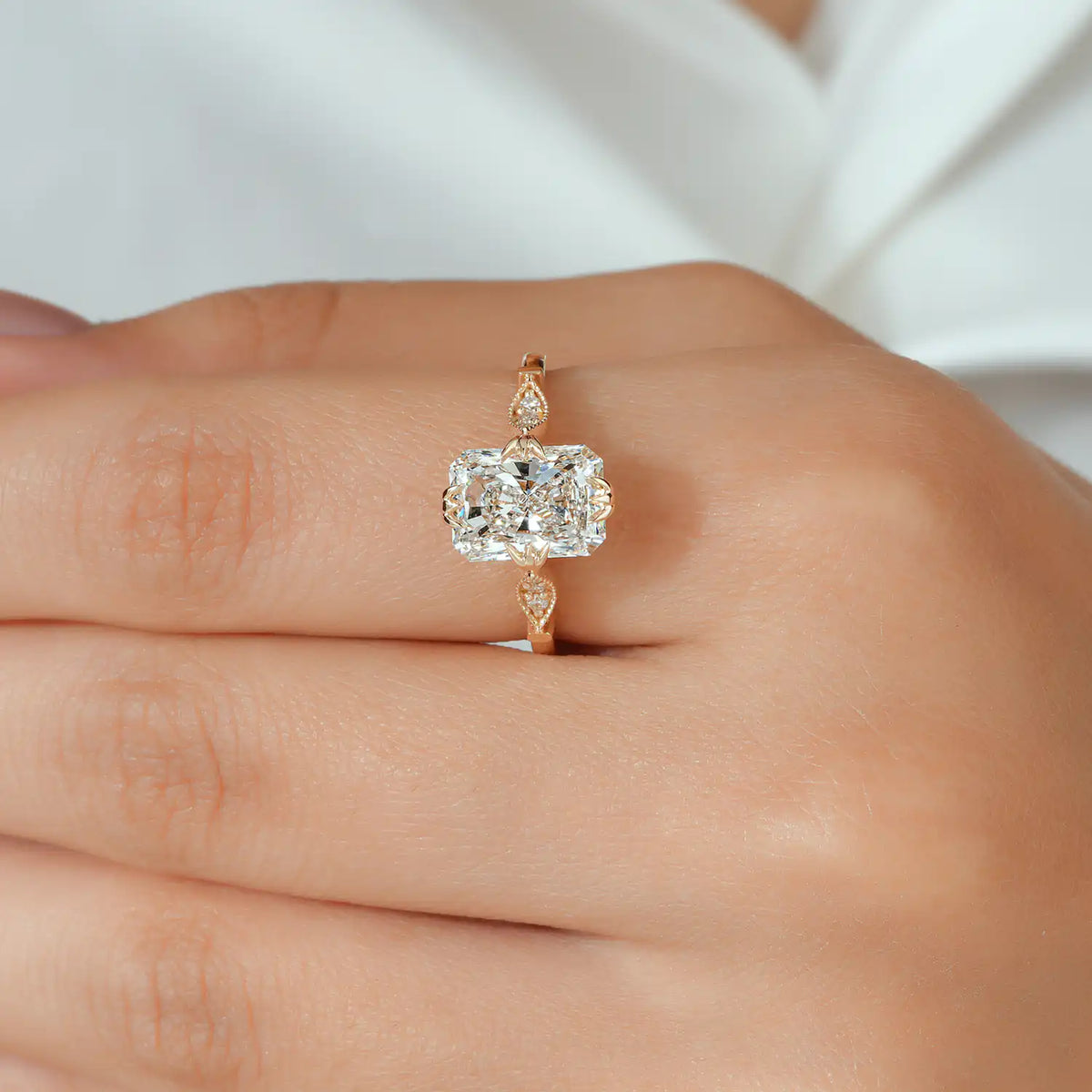 Radiant Cut Lab Grown Diamond Floral Engagement Ring with Petal Prongs and Milgrain Accents