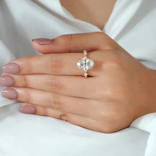 Oval Cut Diamond Ring with Hidden Halo and Marquise Sides
