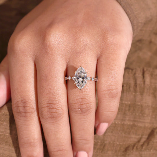 Marquise Diamond Ring with Hidden Halo and Scattered Diamond Ring