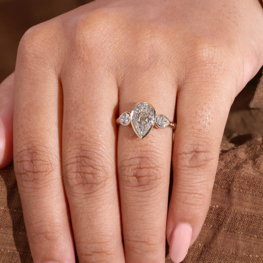 Pear Lab Grown Diamond Three Stone Bezel Ring, Reeded Ring