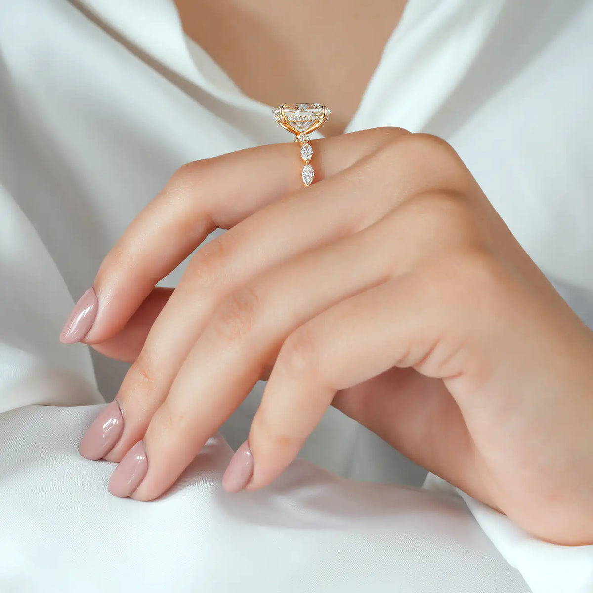 Oval Cut Diamond Ring with Hidden Halo and Marquise Sides