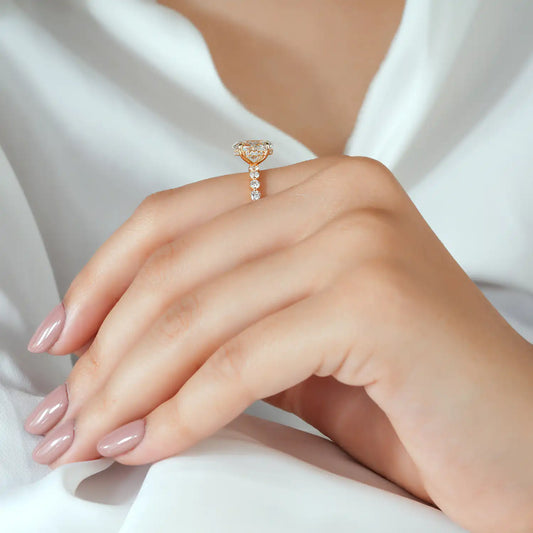 Oval Lab Grown Diamond Engagement Ring with Round Diamond Side Stones