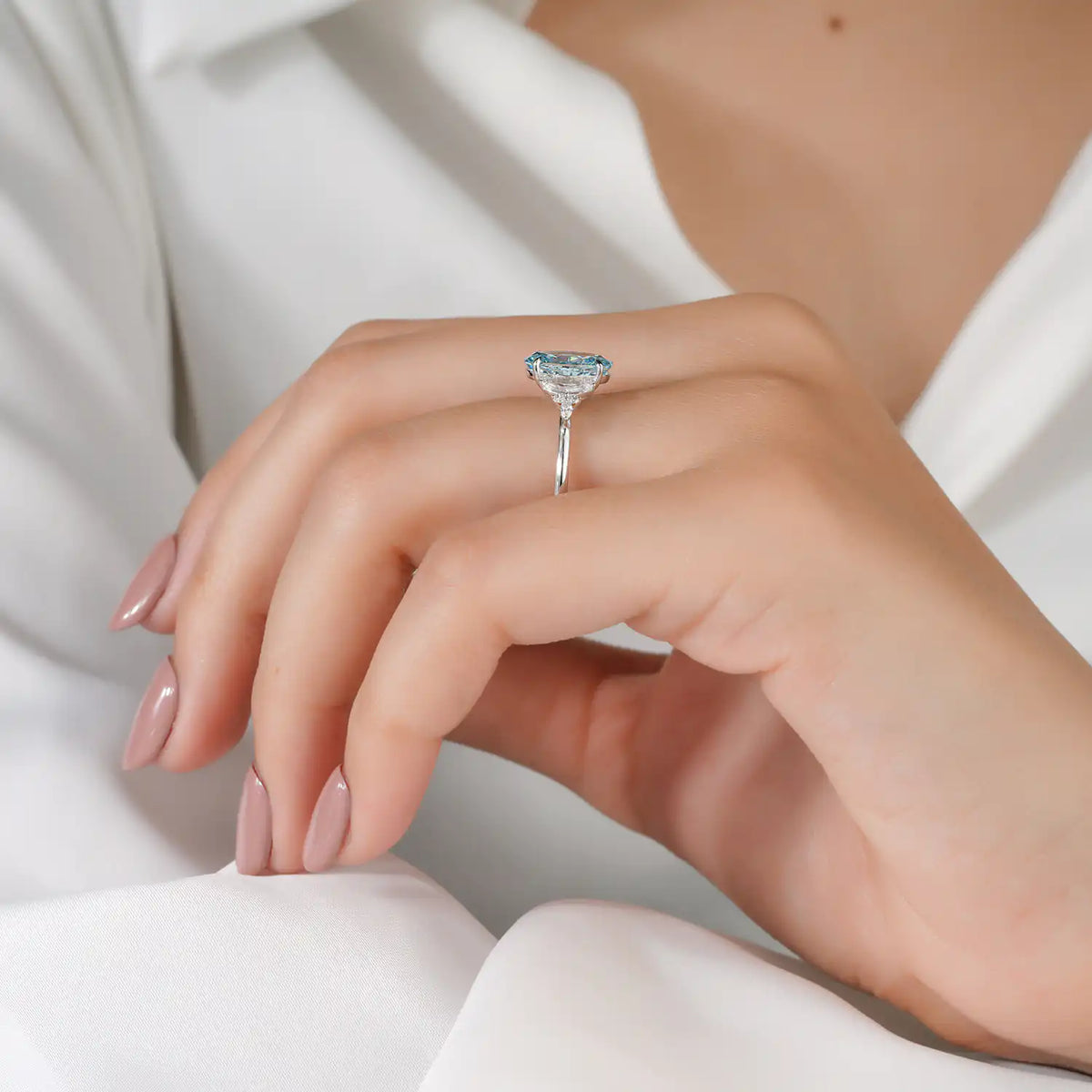 Blue Oval Lab Grown Diamond Ring with Marquise and Round Side Stones
