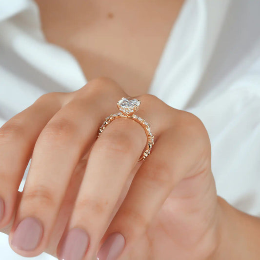 Oval Cut Diamond Ring with Graduated Diamond Shoulders