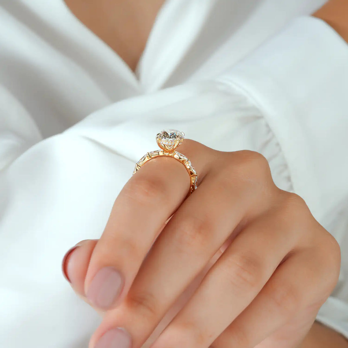 Oval Cut Diamond Ring with Hidden Halo and Marquise Sides