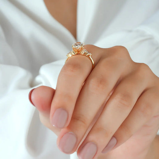 Oval Cut Diamond Ring with Pear and Round Cluster Sides
