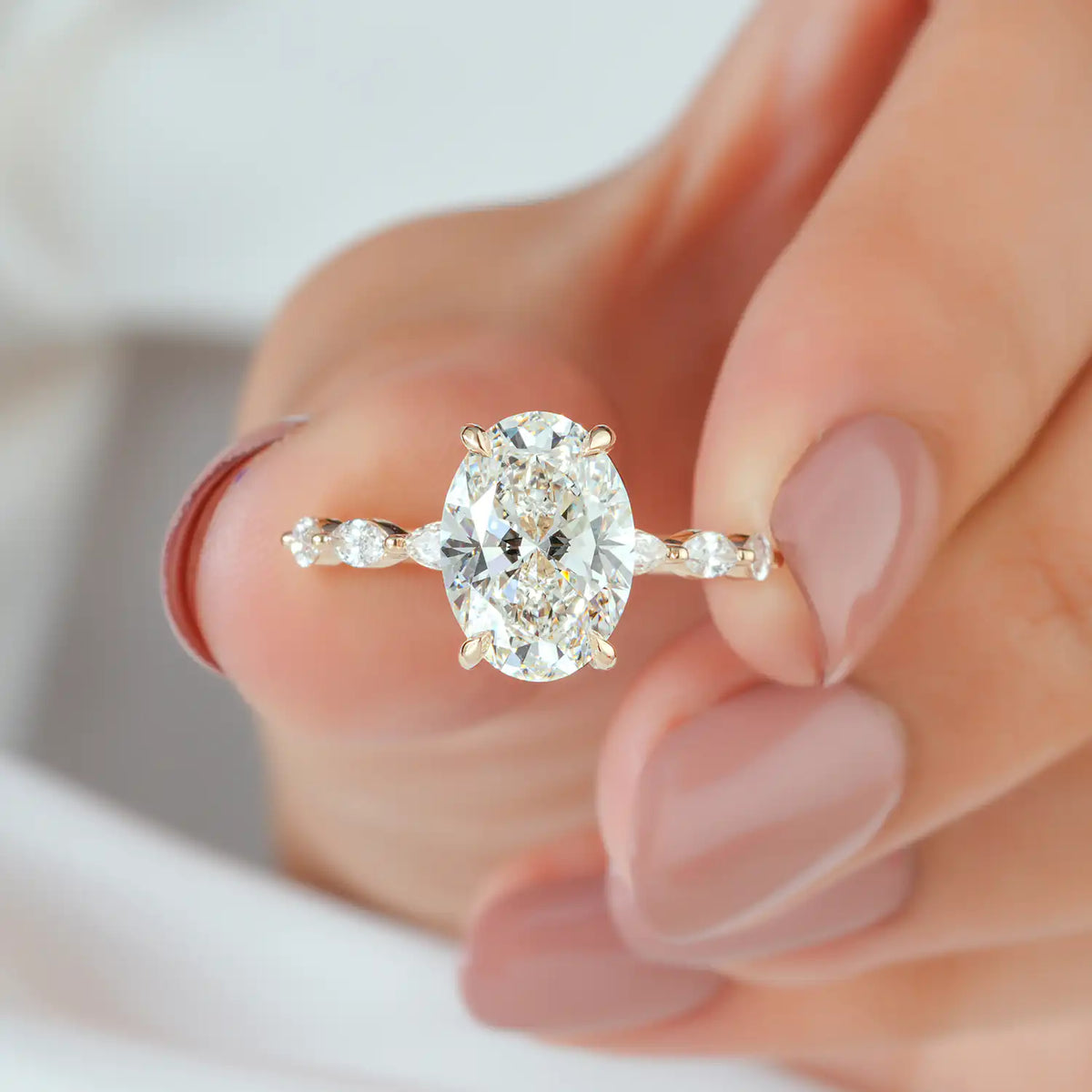 Marquise Side Stone Oval Lab Grown Diamond Engagement Ring with Hidden Halo