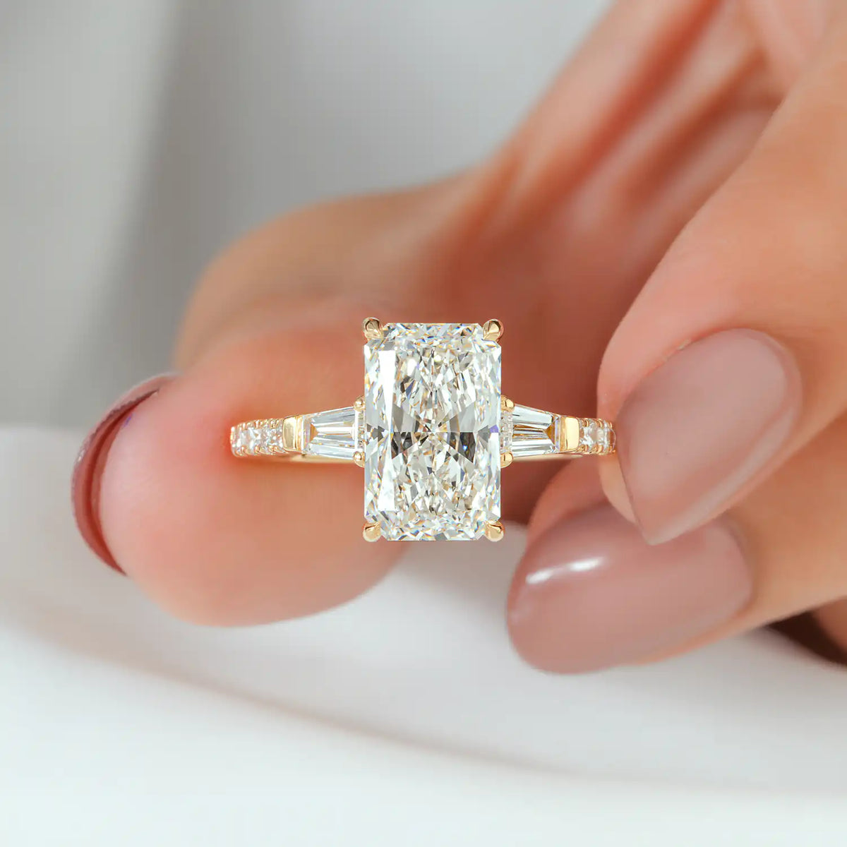 Radiant Cut Lab Grown Diamond Three Stone Engagement Ring with Tapered Baguette and Pave Band