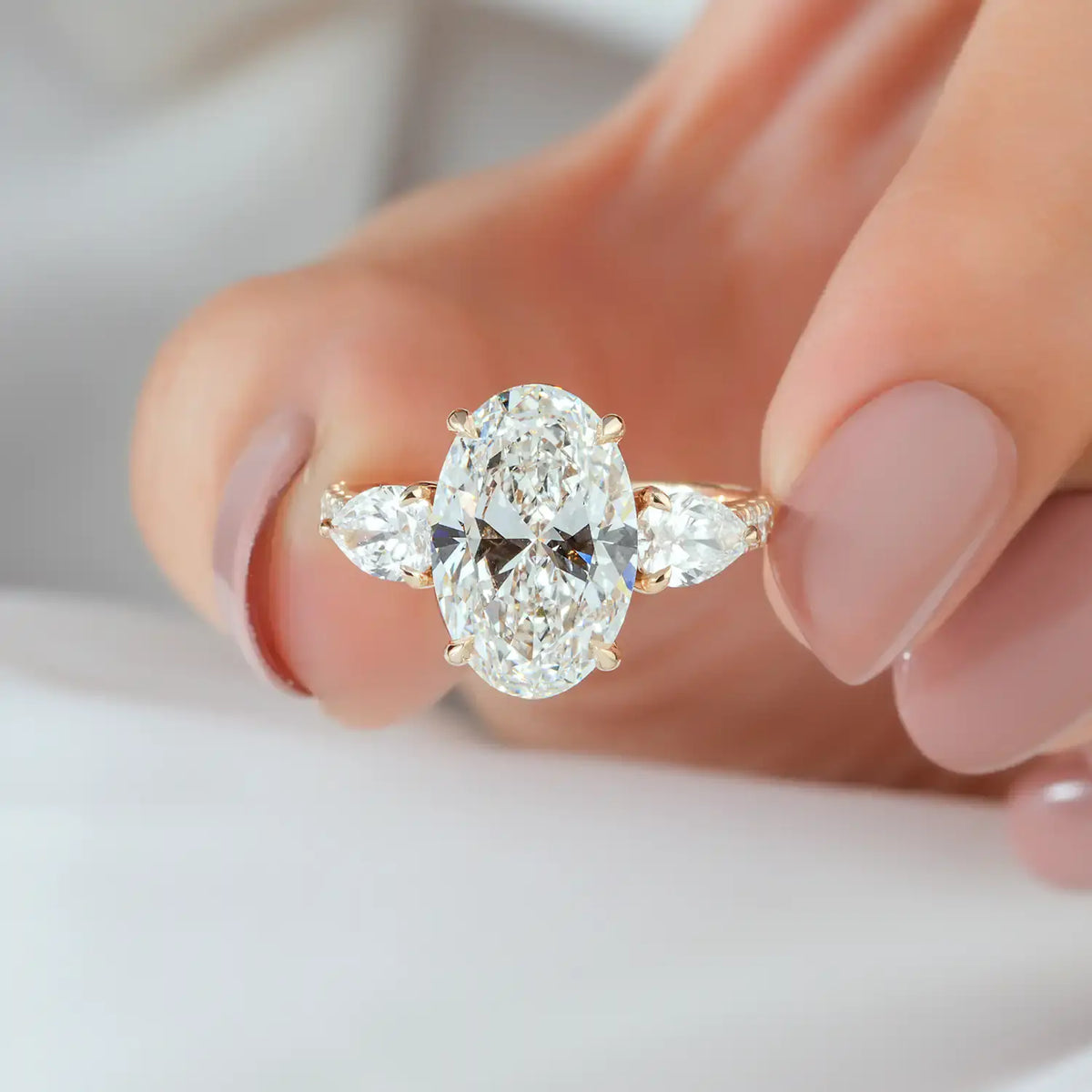 Oval Cut Diamond Ring with Half Moon Side Stones