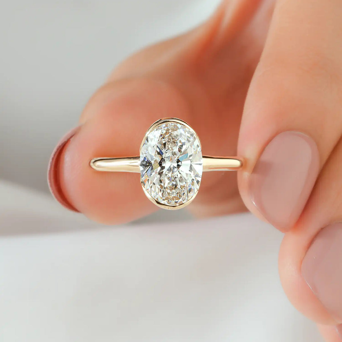 Oval Lab Grown Diamond Half Bezel Solitaire Engagement Ring