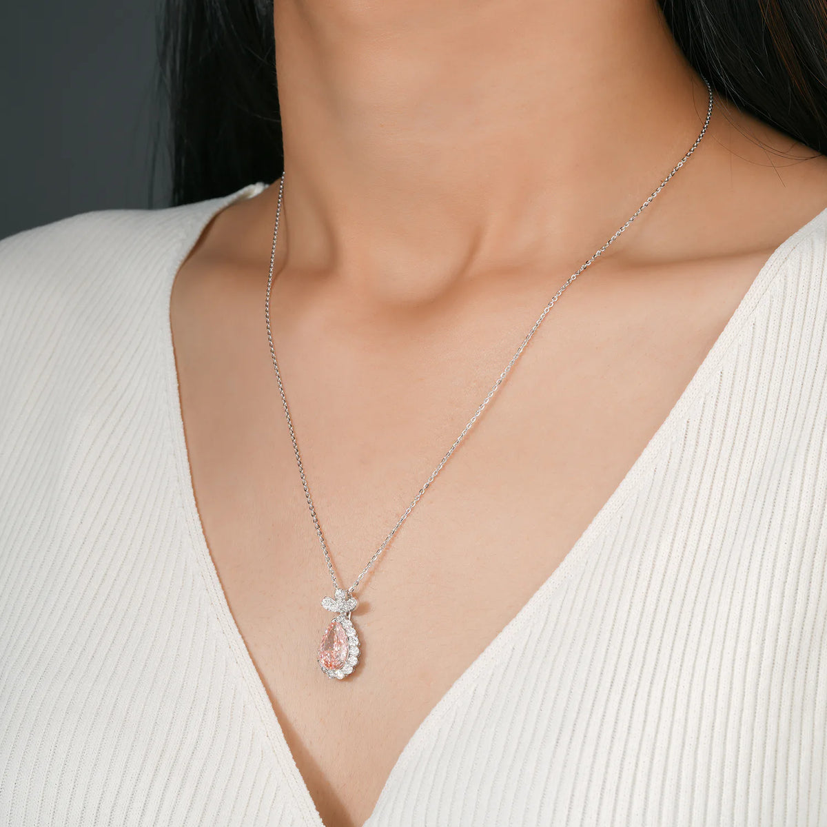 Pear Diamond Halo Pendant with Diamond Bow Bail