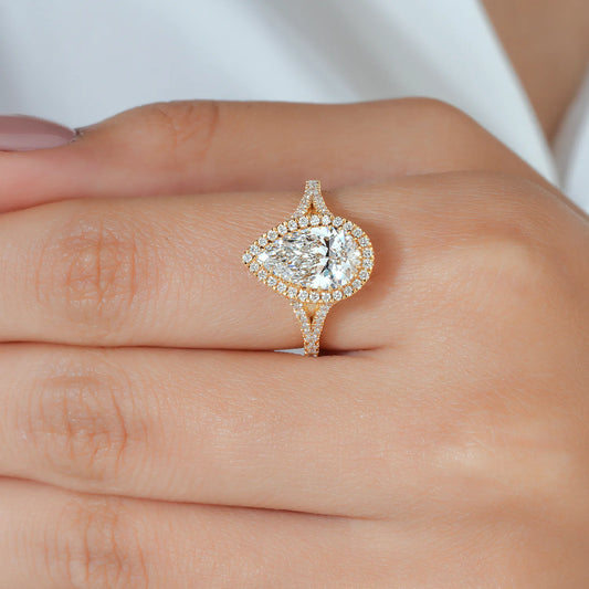 Pear Shaped Hidden Halo Lab Grown Diamond Engagement Ring with Split Shank Pave Band