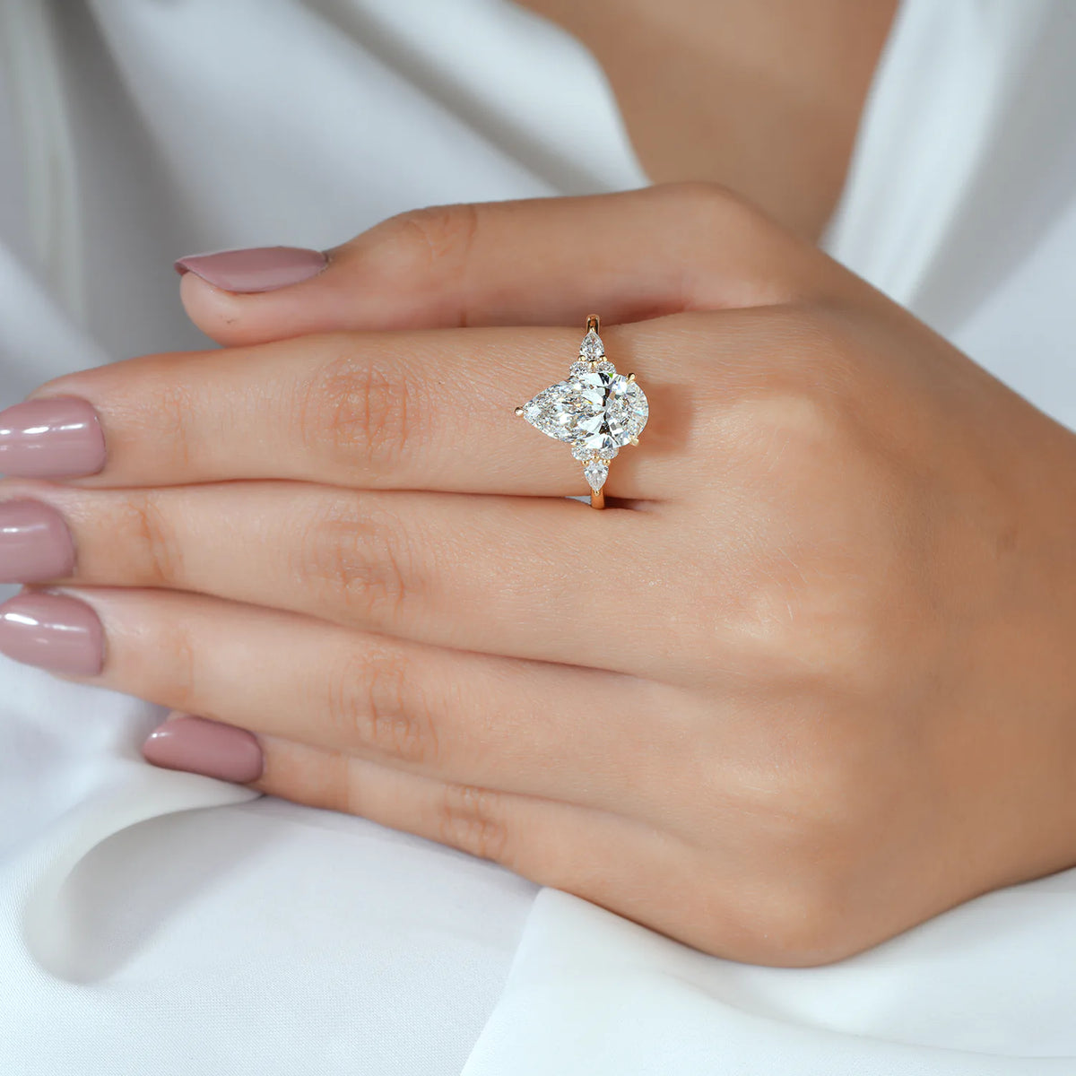 Pear and Round Cut Lab Grown Diamond Cluster Engagement Ring in Yellow Gold