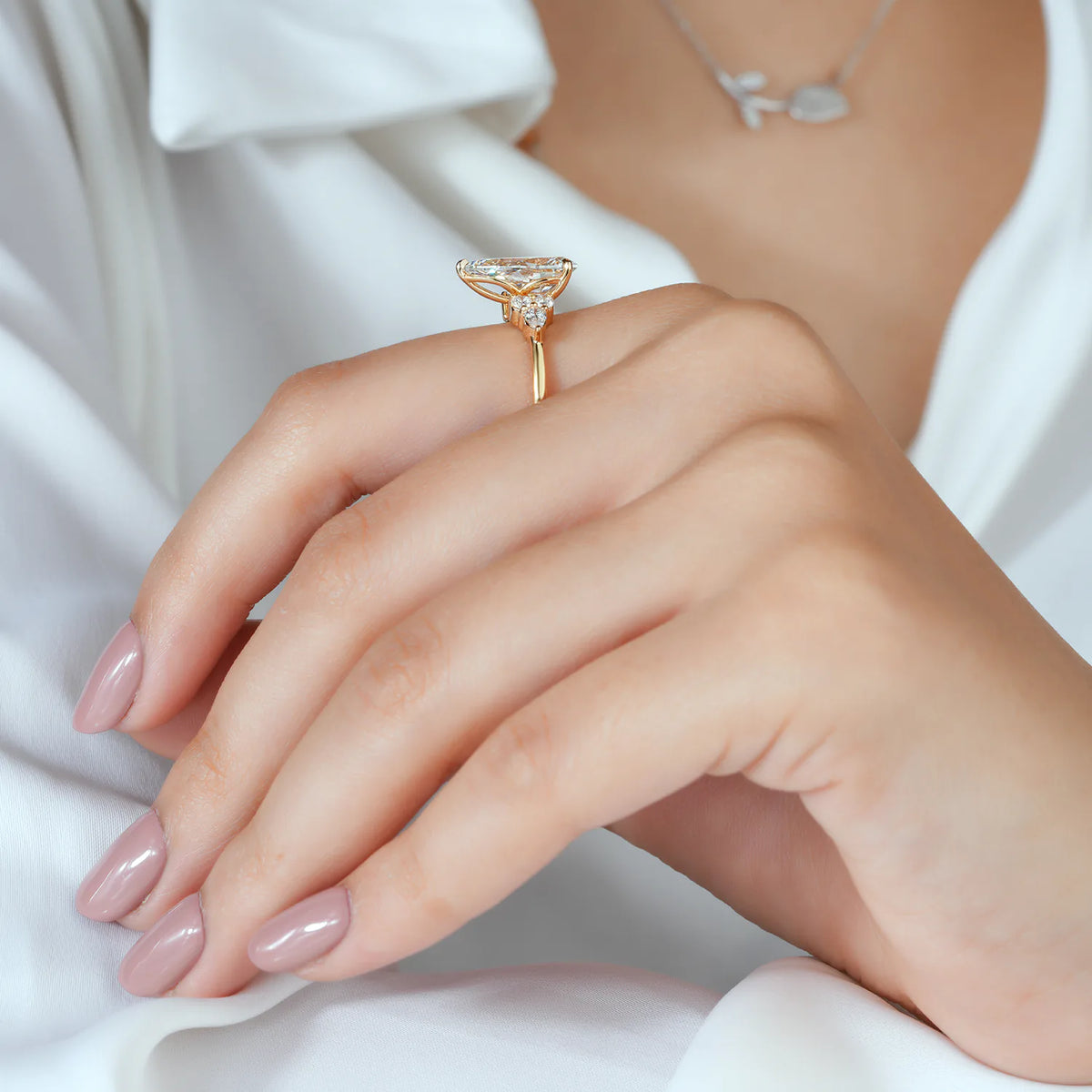 Pear and Round Cut Lab Grown Diamond Cluster Engagement Ring in Yellow Gold