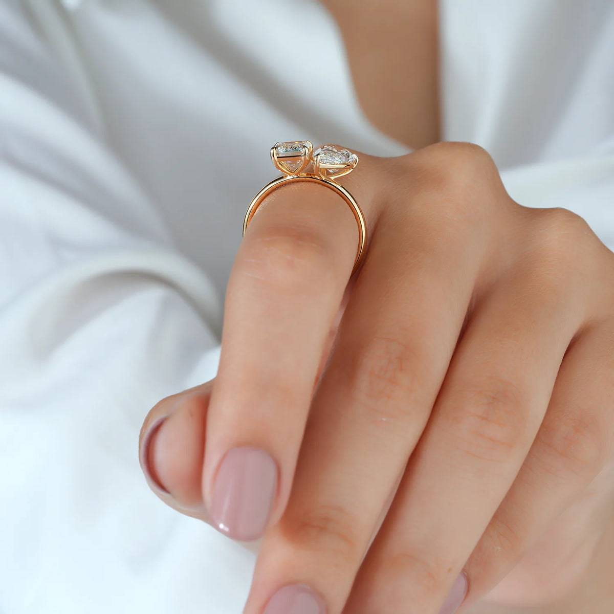 Emerald and Pear Diamond Toi et Moi Ring
