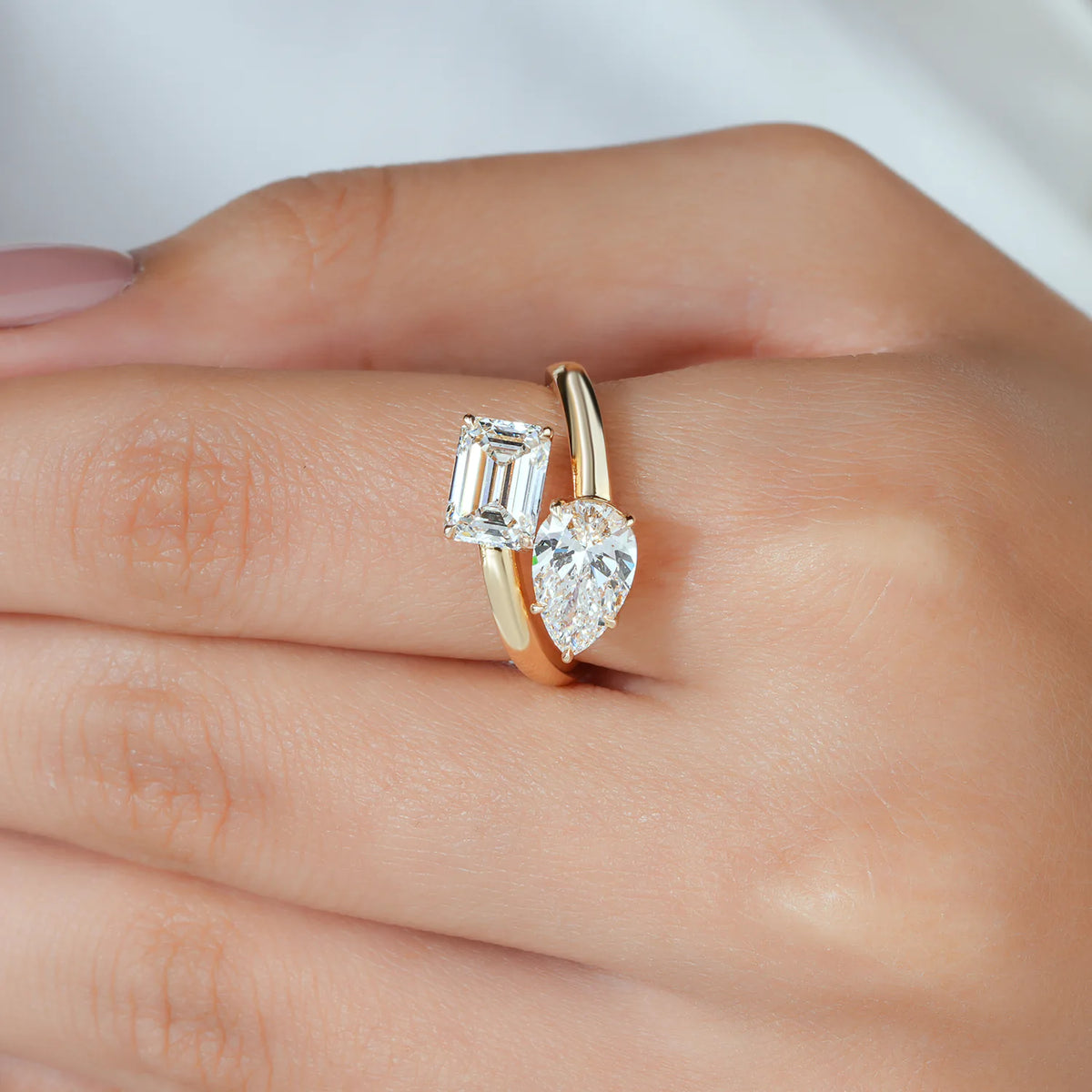 Emerald and Pear Diamond Bypass Toi et Moi Ring