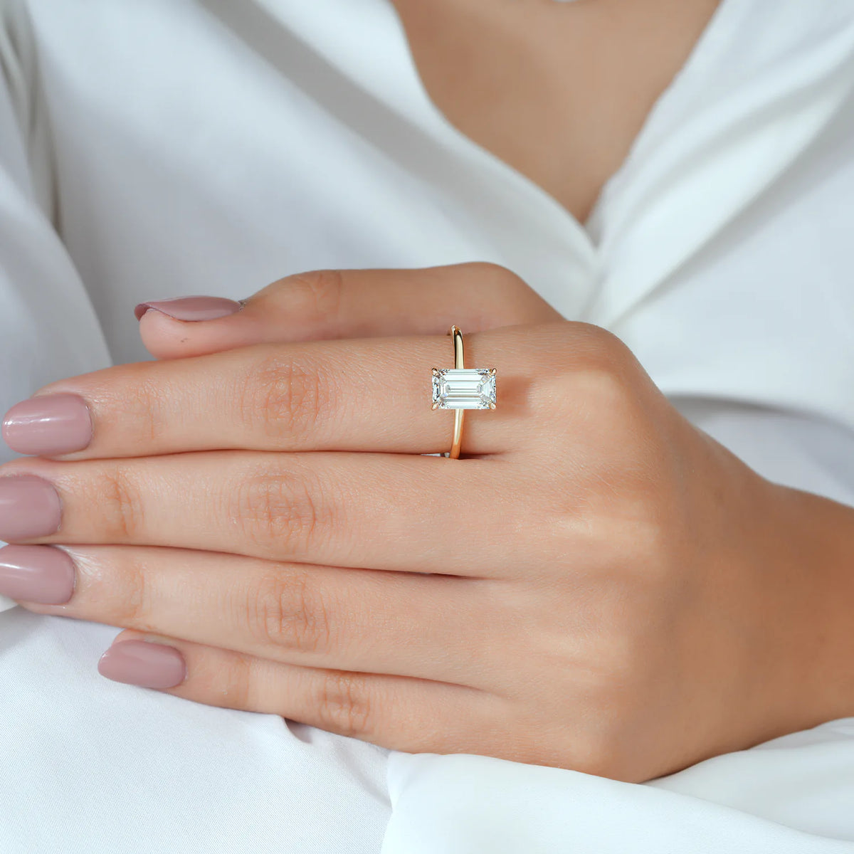 Emerald Cut Solitaire Ring with Hidden Accent