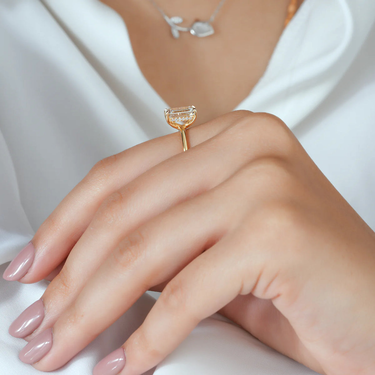 Emerald Cut Solitaire Ring with Hidden Accent