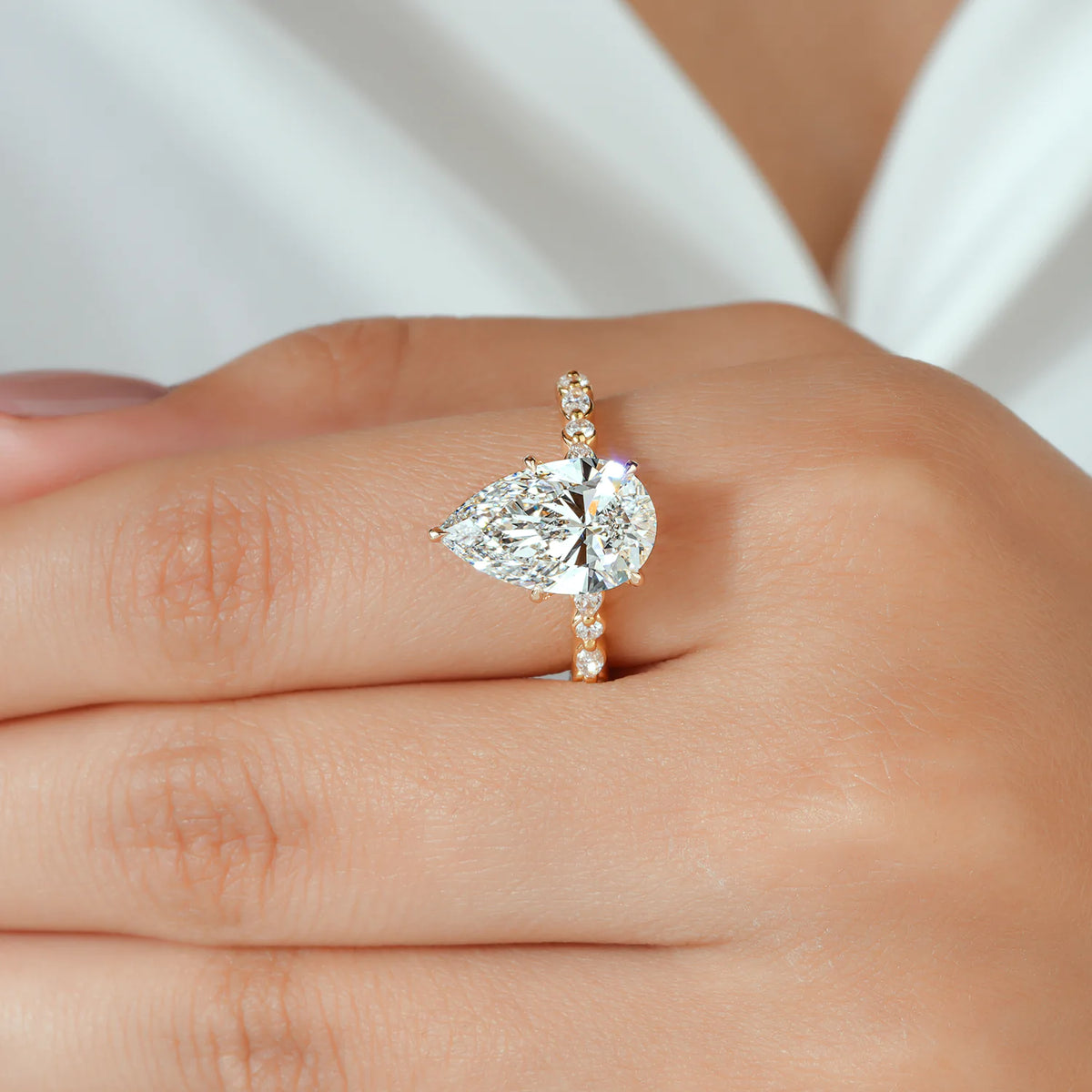 Pear Cut Lab Grown Diamond Engagement Ring with Alternating Marquise and Round Band
