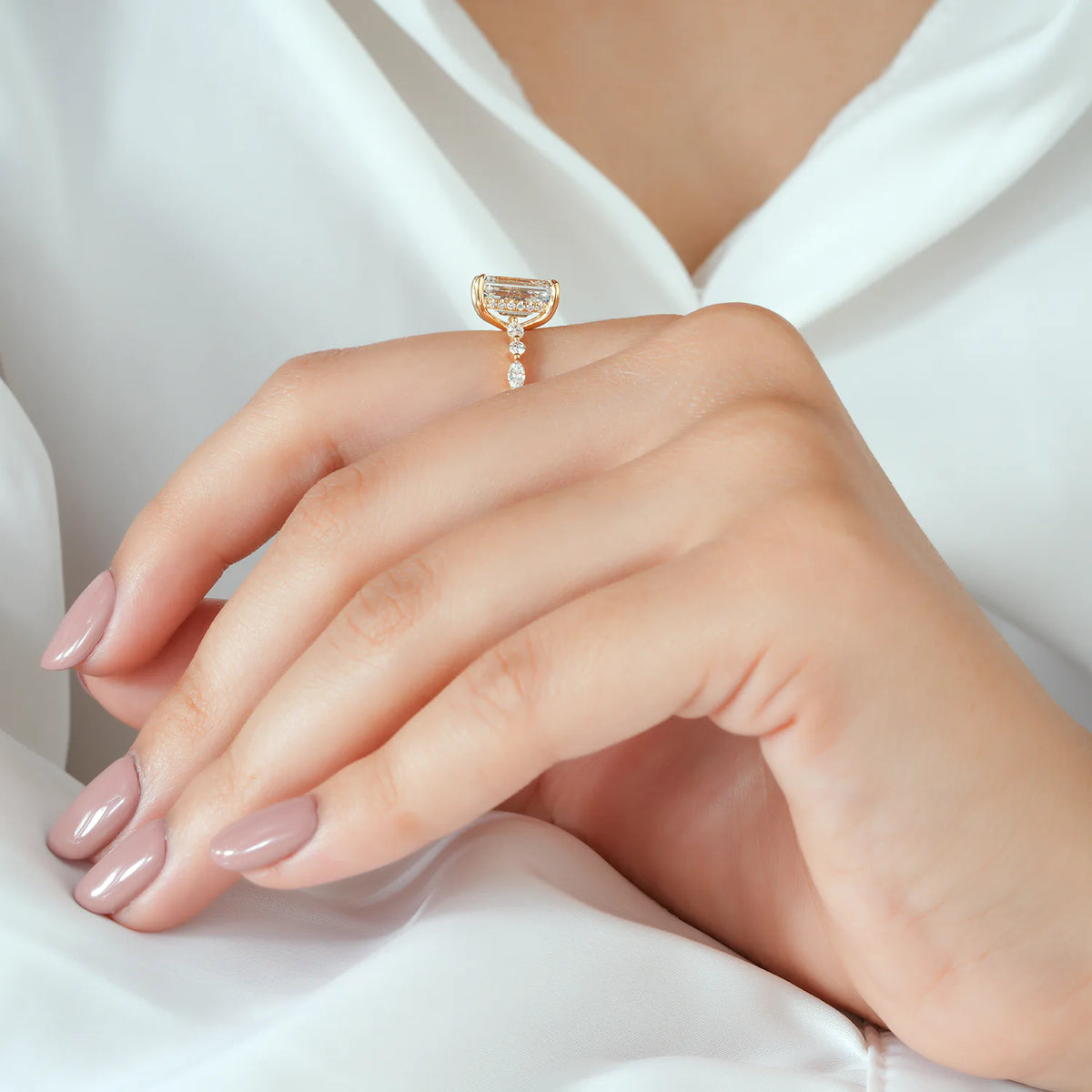 Emerald Cut Ring with Spaced Diamond Clusters