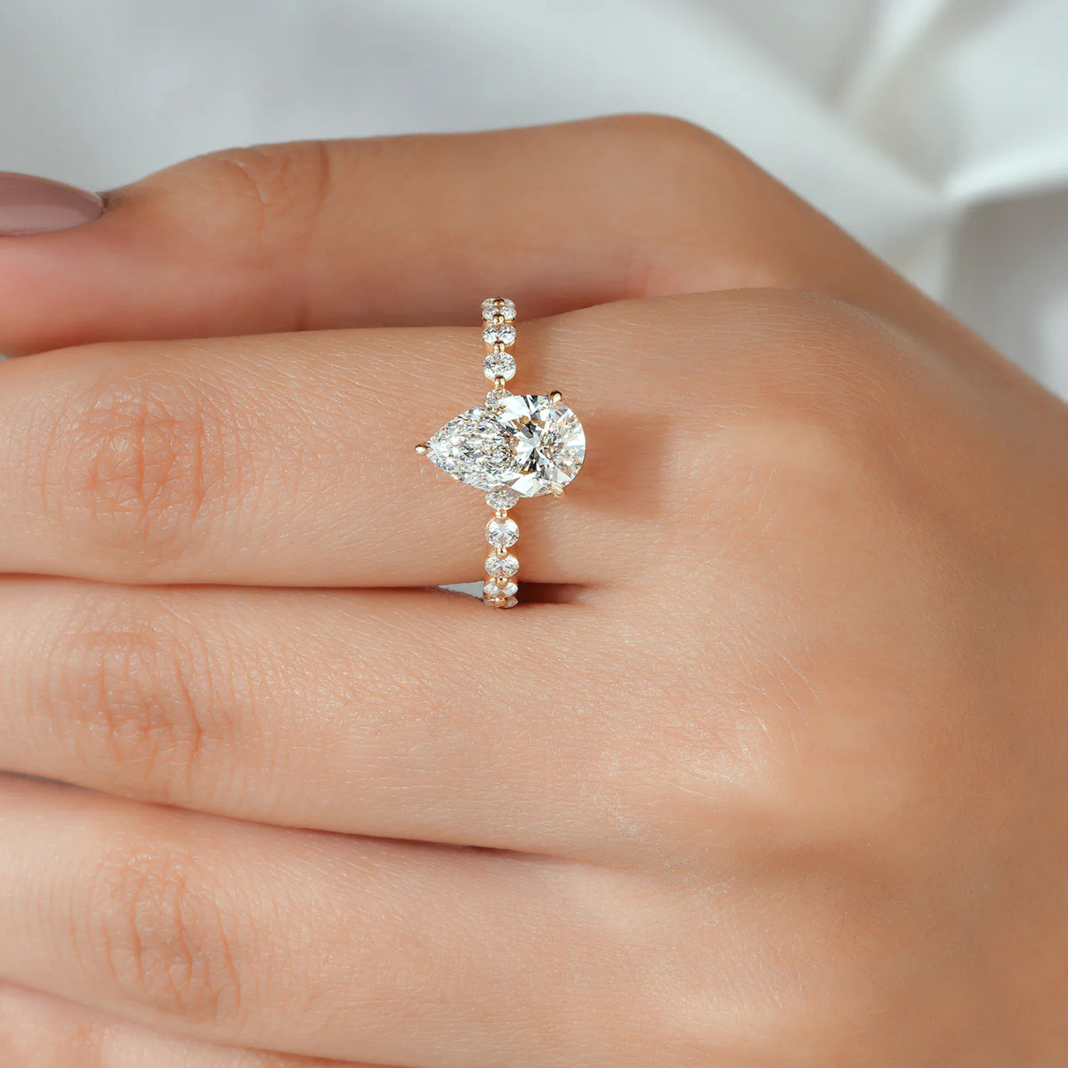 Pear Shaped Lab Grown Diamond Engagement Ring with Floating Round Diamond Band