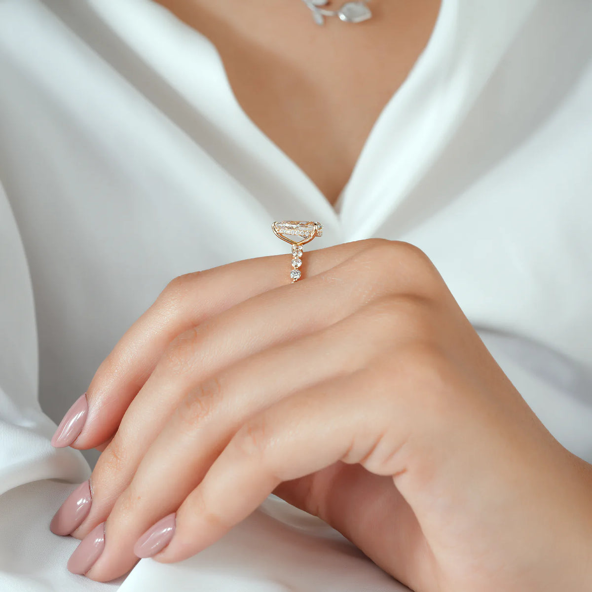 Pear Shaped Lab Grown Diamond Engagement Ring with Floating Round Diamond Band
