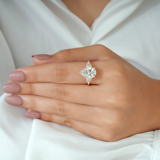 Pear Cut Lab Grown Diamond Cluster Side Stone Engagement Ring in Yellow Gold