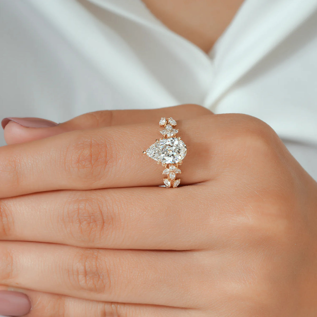Pear Shaped Lab Grown Diamond Engagement Ring with Floral Vine Diamond Cluster Shank
