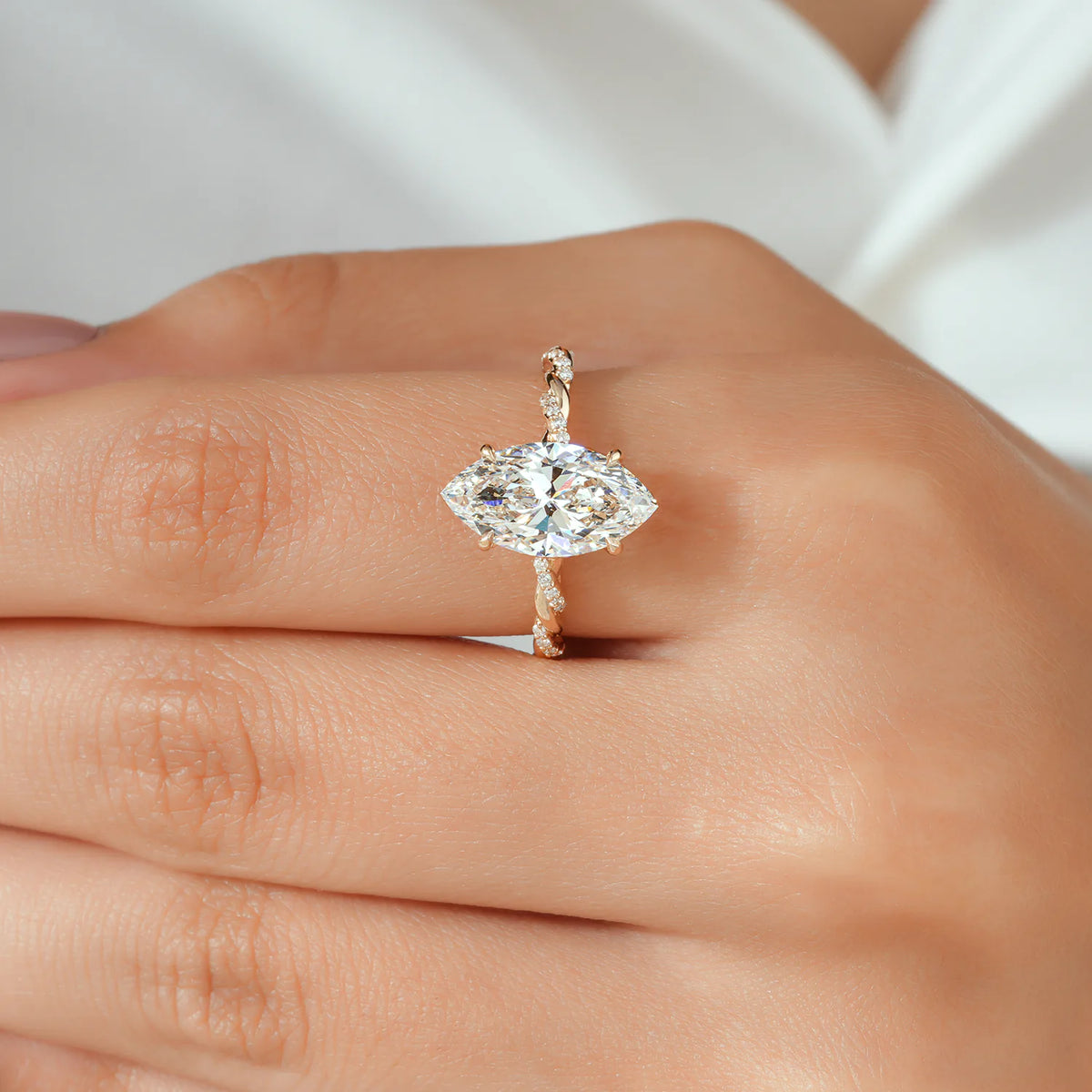 Marquise Cut Lab Grown Diamond Four Prong Twisted Rope Band Engagement Ring with Diamond Accents in Gold or Platinum