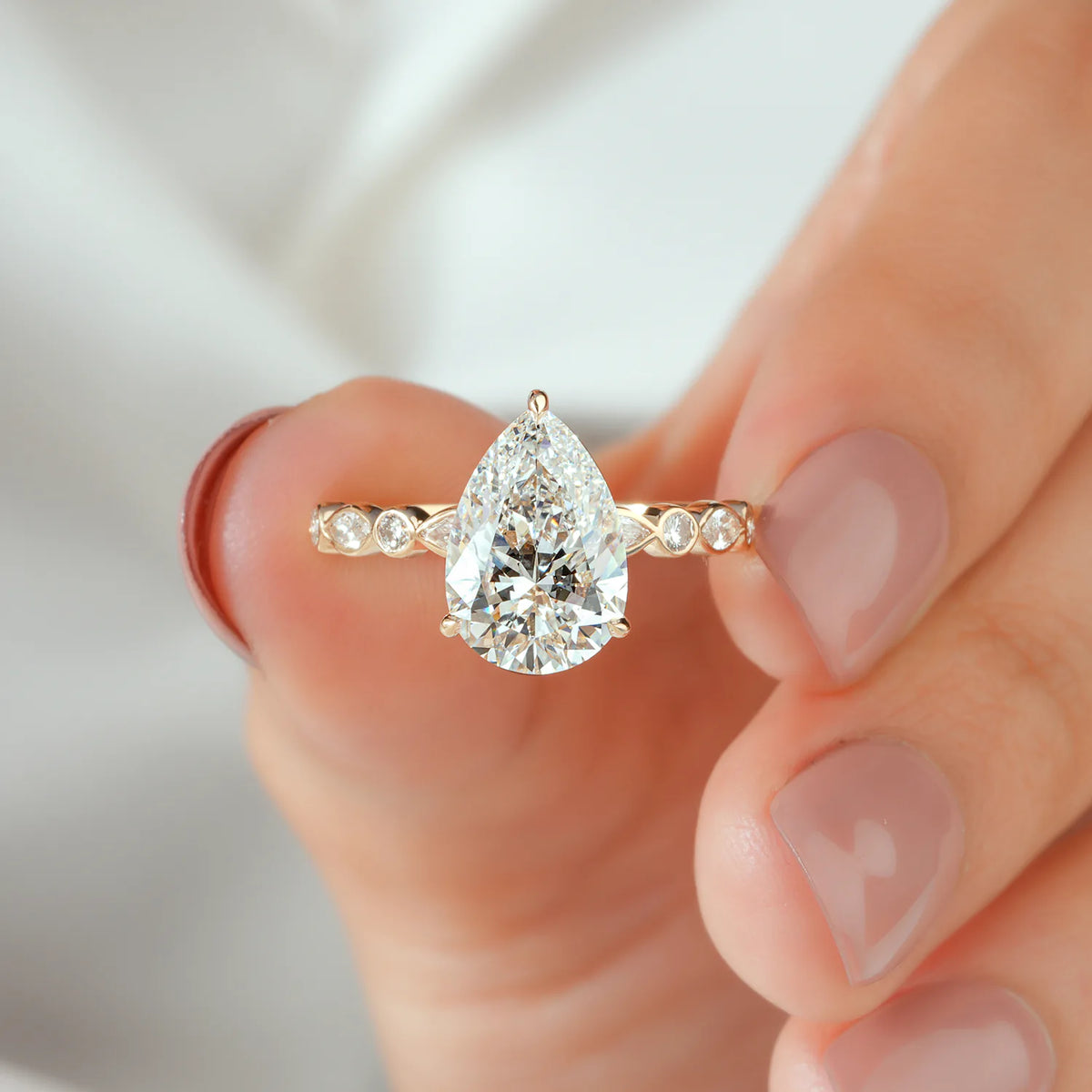 Pear and Marquise Cut Lab Grown Diamond Alternating Ring Engagement Ring in Yellow Gold