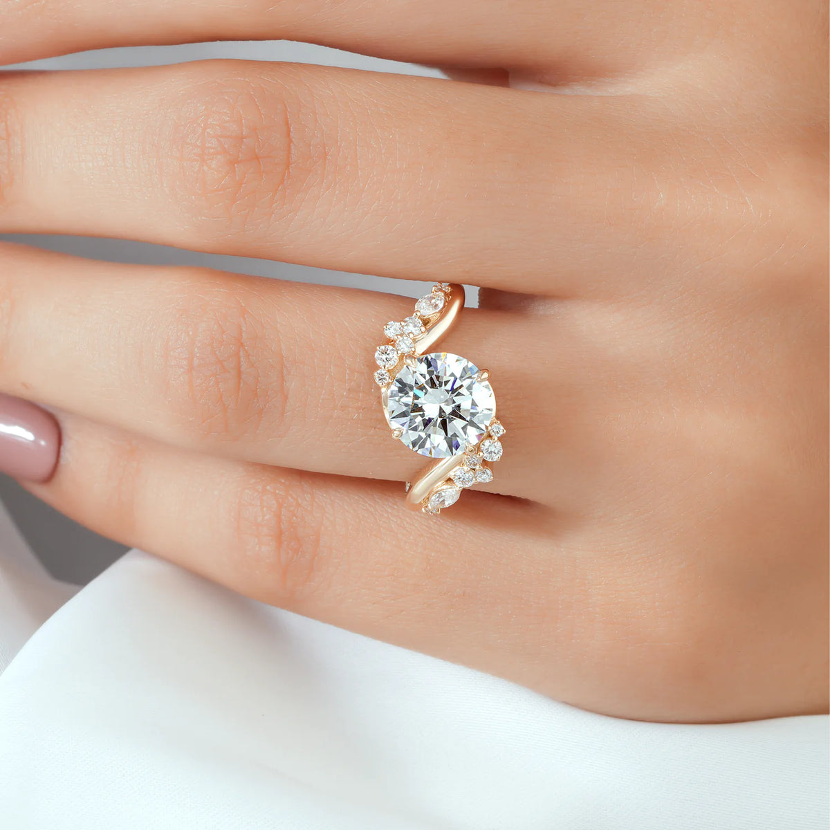 Round Lab Grown Diamond Four Prong Bypass Engagement Ring with Marquise and Round Cluster Side Diamonds in Gold or Platinum