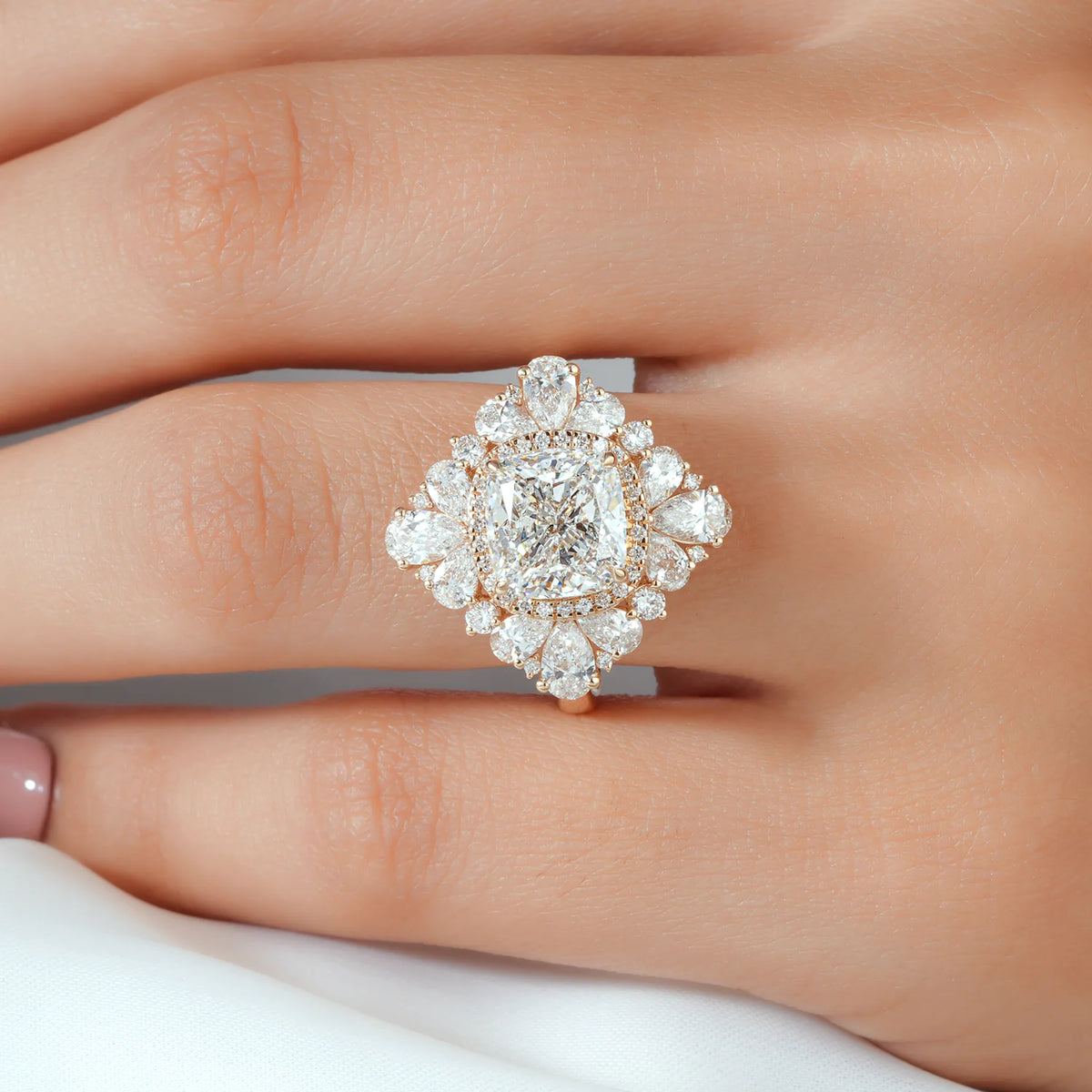 Cushion Cut Lab Grown Diamond Halo Engagement Ring with Pear Shaped Diamond Petals and Round Accents in Gold or Platinum