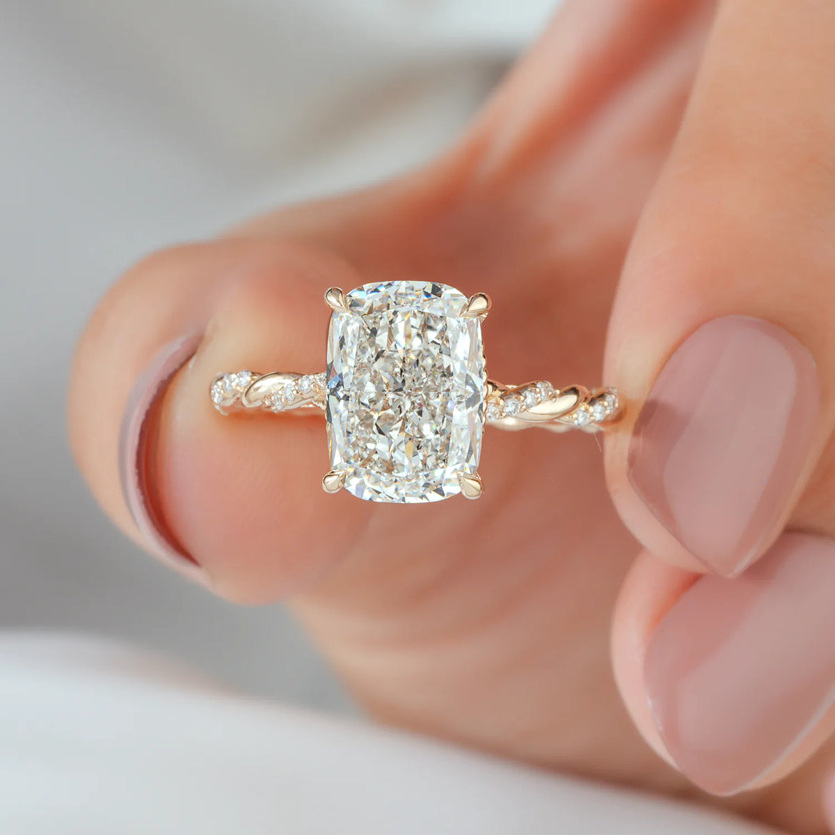 Elongated Cushion Cut Lab Grown Diamond Four Prong Twisted Rope Band Engagement Ring with Diamond Accents in Gold or Platinum