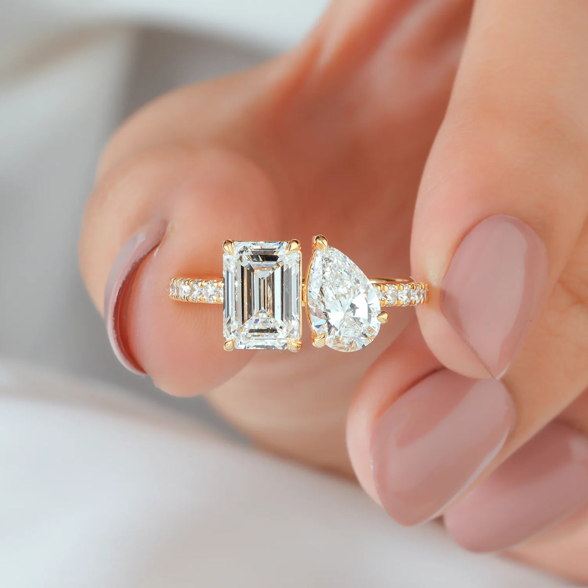 Emerald and Pear Diamond Toi et Moi Ring with Pave Ring