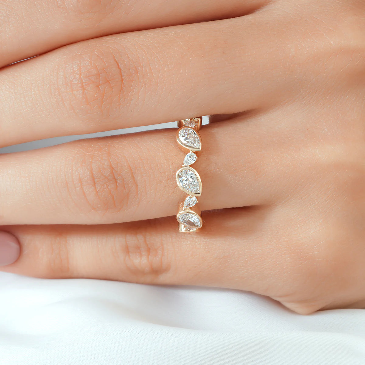 Bezel Set Pear Diamond Half Eternity Band