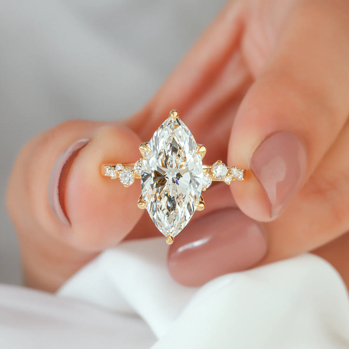 Marquise Cut Lab Grown Diamond Six Prong Engagement Ring with Scattered Side Diamonds and Hidden Halo in Gold or Platinum