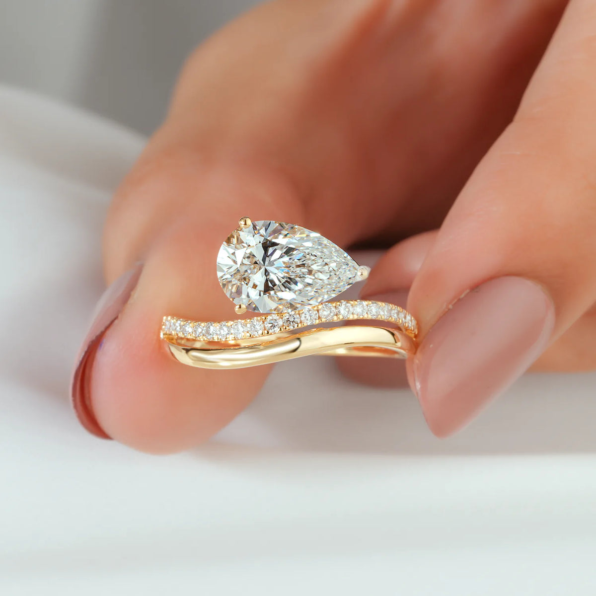 Pear Cut Lab Grown Diamond Curved Bypass Engagement Ring in Yellow Gold