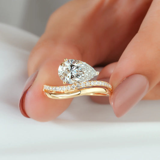 Pear Cut Lab Grown Diamond Curved Bypass Engagement Ring in Yellow Gold