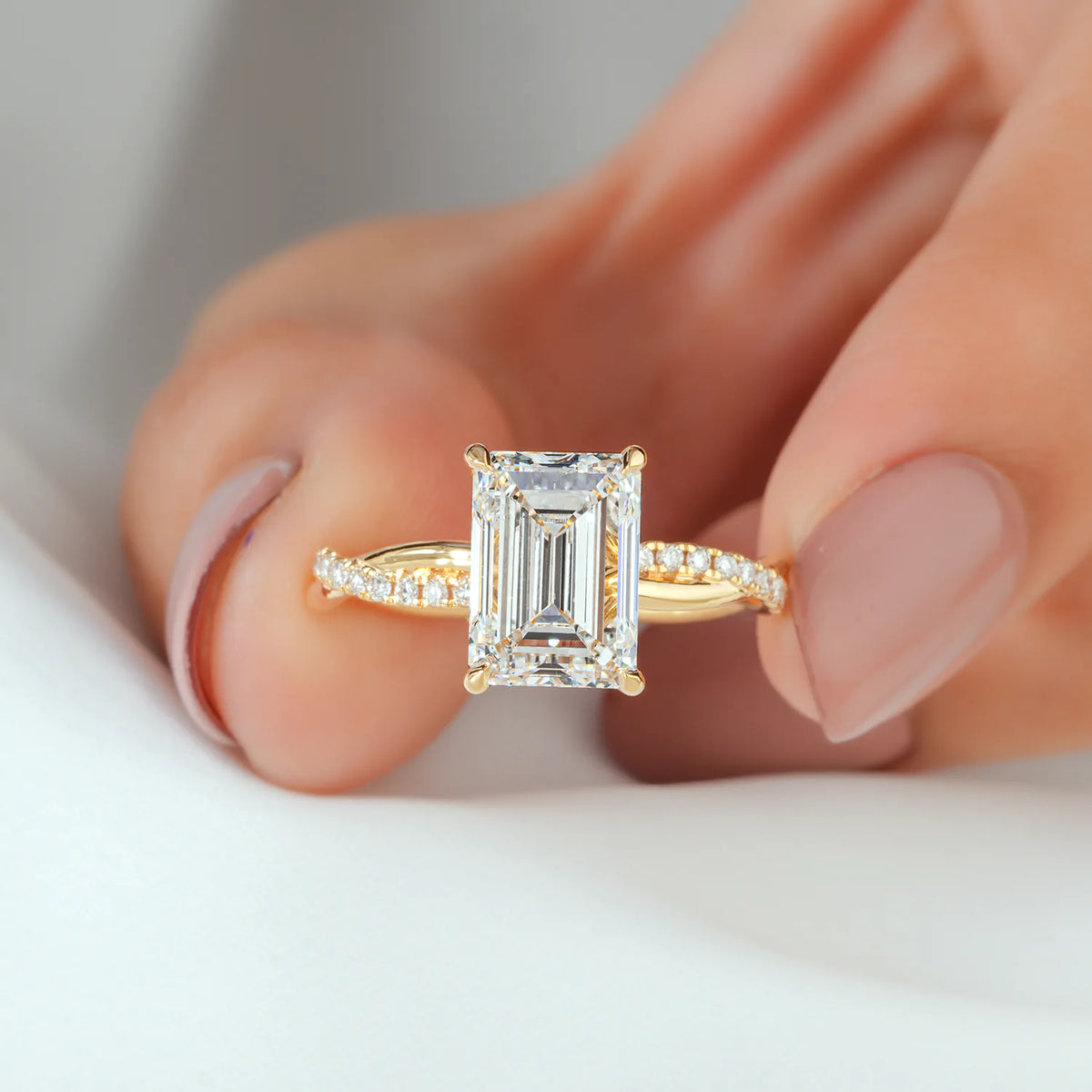 Emerald Cut Twisted Pavé Diamond Ring