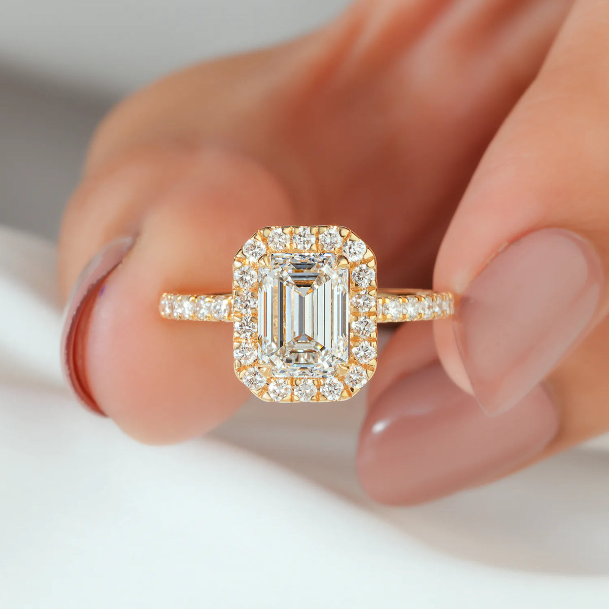Emerald Cut Halo Ring with Hidden Accent