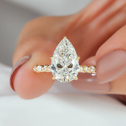 Pear Cut Lab Grown Diamond Engagement Ring with Alternating Marquise and Round Band