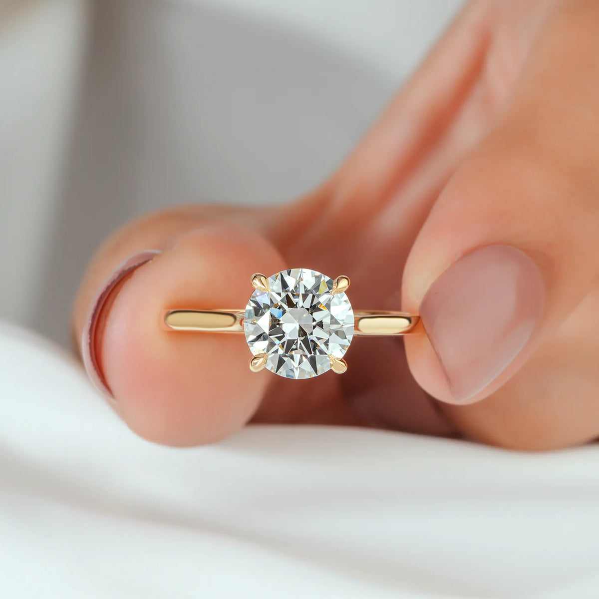Modern Round Lab-Grown Diamond Solitaire Engagement Ring with Open Gallery