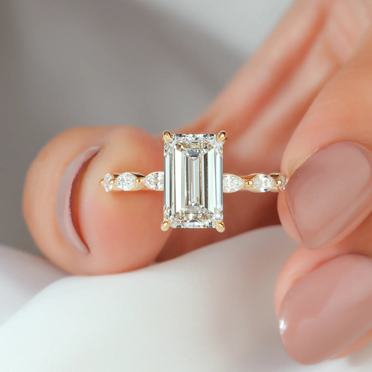 Emerald Cut Ring with Marquise Accent Clusters