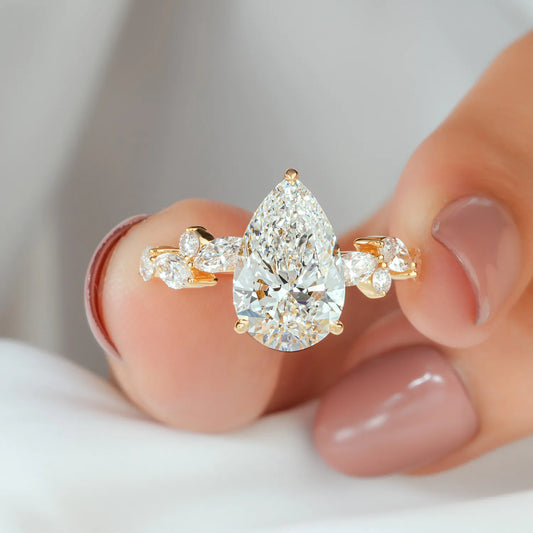 Pear Cut Lab Grown Diamond Cluster Engagement Ring in Yellow Gold