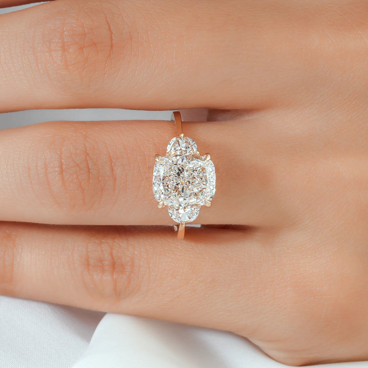 Cushion Cut Lab Grown Diamond Four Prong Three Stone Engagement Ring with Half Moon Side Diamonds in Gold or Platinum